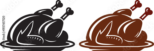 Roasted turkey with two drumsticks on a platter in black and brown