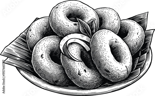 Indian medu vada savory donuts on banana leaf vintage engraving woodcut style art