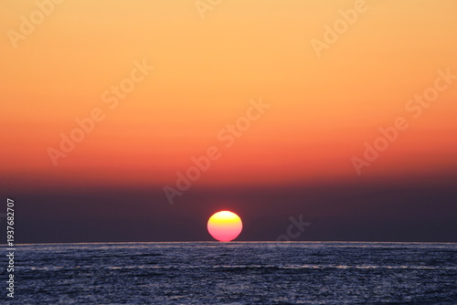 Beautiful Sunset over the Sea of Japan in Niigata with Copy Space / 日本海の美しい夕日（新潟）と余白のある海の風景