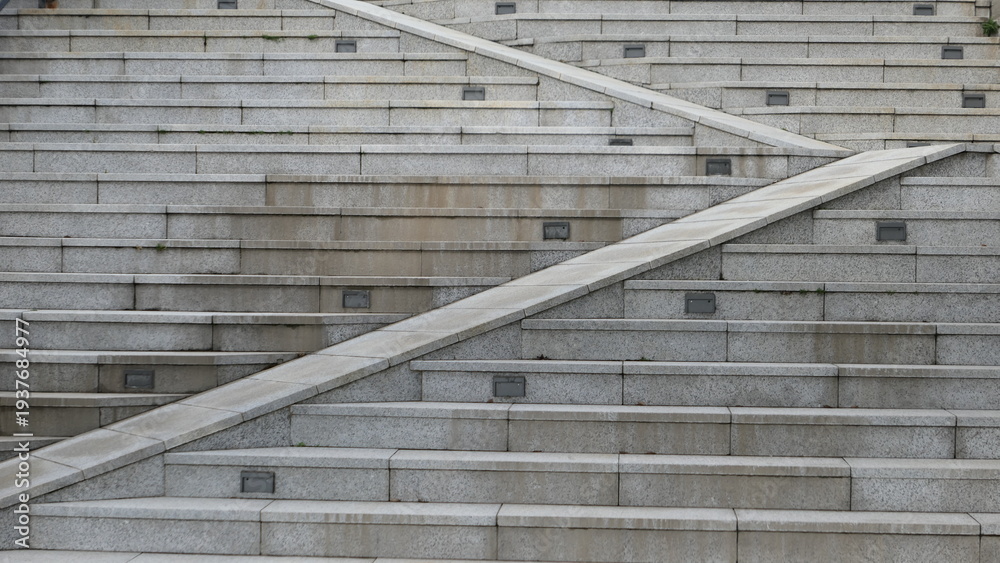 Fototapeta premium Stone Staircase Pattern with Diagonal Ramp in Modern Architecture
