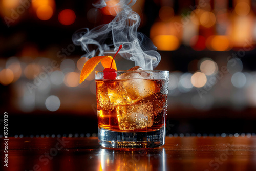 Old fashioned cocktail on a bar.