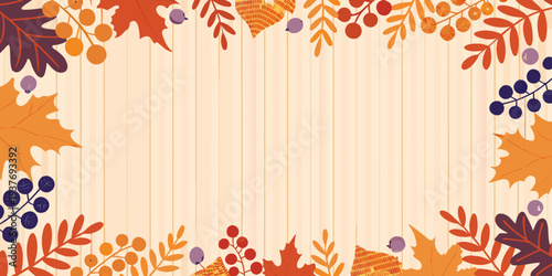 Autumn leaves and berries create a decorative border around a blank space
