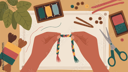 Hands crafting colorful woven threads on a loom with scissors beads and art supplies nearby on a table