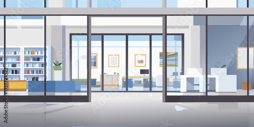 Modern office interior viewed through large glass doors and reflective floor