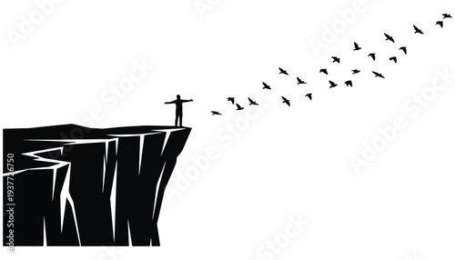 A silhouette of a man standing on a cliff edge with birds flying away