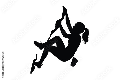 Silhouette of a woman doing a handstand in a dress