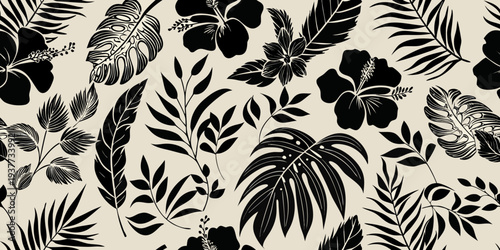 Black tropical leaves and hibiscus flowers on a beige background
