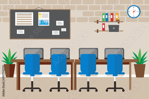 A brightly colored office space with computers and a bulletin board