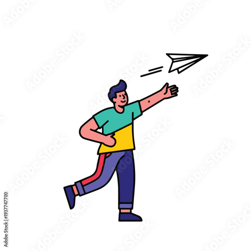 Man in casual clothes throwing a paper airplane outdoors