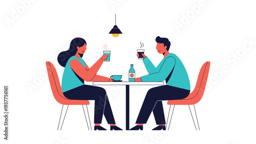Young couple sitting at a cafe table having a romantic coffee date and talking together in a relaxed and friendly atmosphere at a bistro.