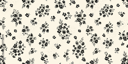 A seamless pattern of delicate black floral arrangements on a cream background