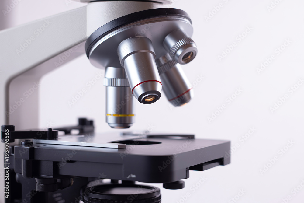 Fototapeta premium Close up view of a scientific microscope in a laboratory, used for research and analysis