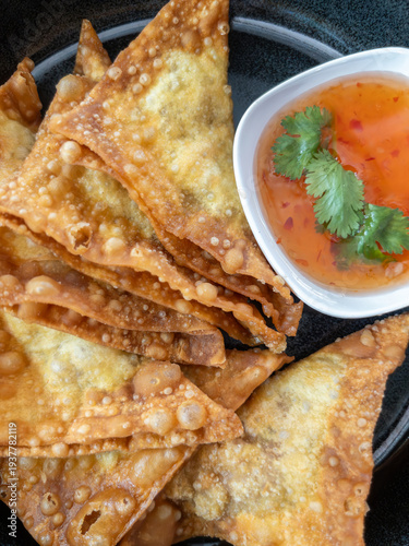Crispy Golden Fried Pork Wontons with Dipping Sauce.
