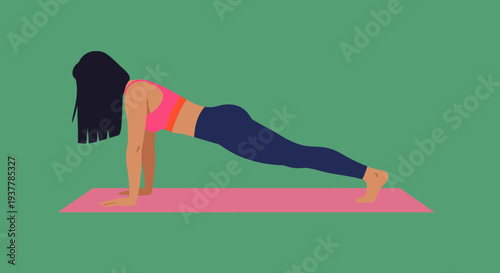 Woman doing a plank exercise on a yoga mat.