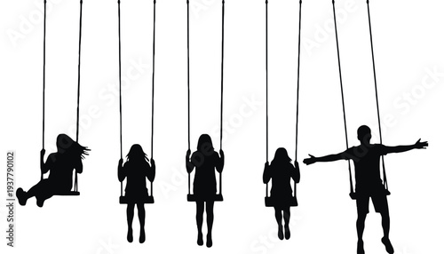 Silhouette of children playing on swings in a park at sunset