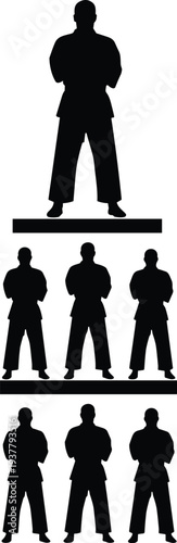 Silhouette pyramid of martial artists in tiers, black and white vector illustration symbolizing hierarchy, discipline, leadership, teamwork, and martial arts training concepts