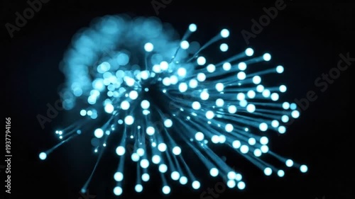 Abstract blue fiber optic cables with glowing light tips for high speed data transmission and digital communication technology