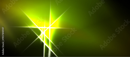 Bright starburst dominates dark background. Vivid green hues radiate outward, creating dramatic light effect. Simple, striking visual.