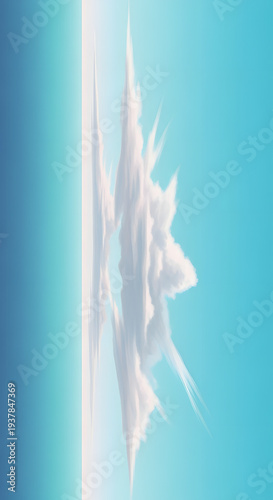 A vast, clear blue sky with wispy white clouds stretches over a tranquil, deep blue ocean, creating a peaceful and expansive scene.