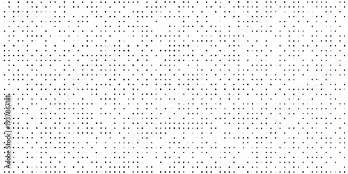 Dense pattern of small black dots covering a stark white background