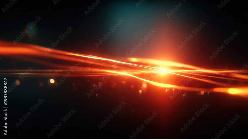 Fototapeta premium Abstract glowing orange light streaks and bokeh on a dark background