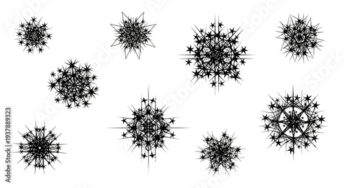 Black intricate geometric snowflake designs on white background abstract shapes and patterns