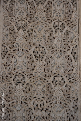 Andalusian art on the facade of an ancient buildin