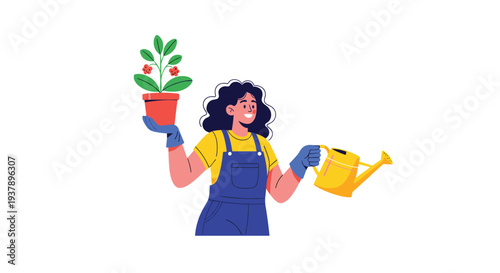 Happy woman gardener in blue overalls and yellow shirt holding a potted plant and a yellow watering can while smiling at the camera.