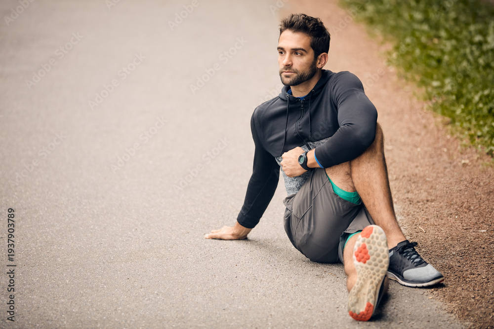 Obraz premium Active, man and stretching legs outdoor with fitness, exercise start or preparation for cardio challenge. Space, person and runner warm up on road with wellness, begin and getting ready for workout.