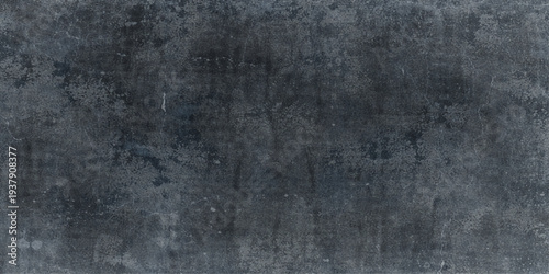 Abstract an eroded metallic surface texture, showcasing a gradient of gray shades, evokes a sense of age and understated elegance. 