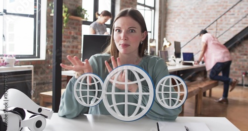 Displaying equilibrium constants for 2SO2(g)+O2(g)?2SO3(g) on whiteboard, equations R T ?n