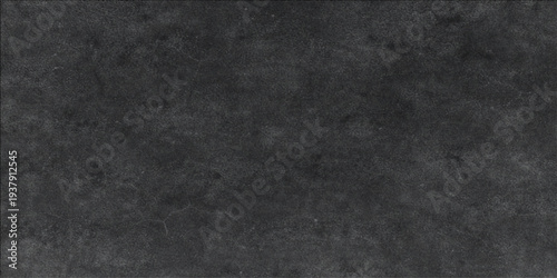 Abstract a sophisticated, dark gray stone, its textured surface a canvas of natural artistry, inviting touch and contemplation.