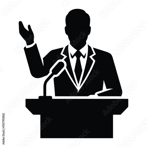 Silhouette of a man speaking at a podium
