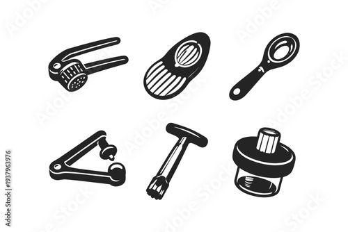 Collection of six simple black and white kitchen gadgets and tools on a white background