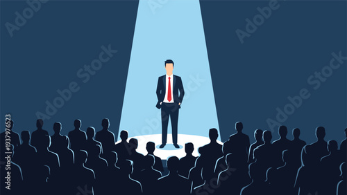 Confident businessman standing in a bright spotlight on a stage, addressing a large audience silhouette, symbolizing public speaking or presentation.