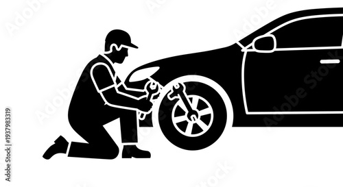 Man Changing Car Tire Silhouette.