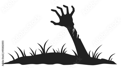 Spooky zombie hand rising from dark grave mound