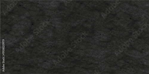 Abstract, textured black stone, offering a sense of rugged elegance and raw beauty. The stone's surface reveals subtle variations in tone, creating an aesthetic appearance.