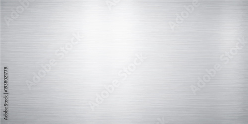 Abstract a clean, brushed metallic surface background, conveying a sense of modern, industrial aesthetic.