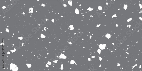 Gray background with scattered white irregular shapes