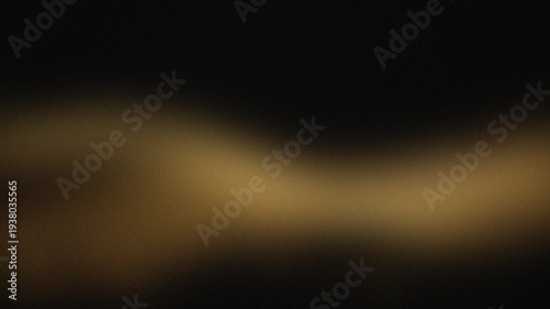 Abstract blurred background with soft golden and dark tones