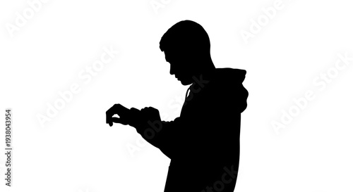 Silhouette of a young man.