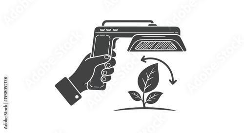 Hand holding growth lamp plant.