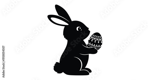 Black silhouette vector graphic illustration of an adorable bunny rabbit holding a decorated holiday easter egg