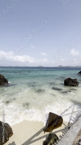 Relaxing beach waves tropical island nature photography coastal environment scenic viewpoint serenity concept