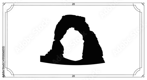 Black silhouette of natural rock formation.