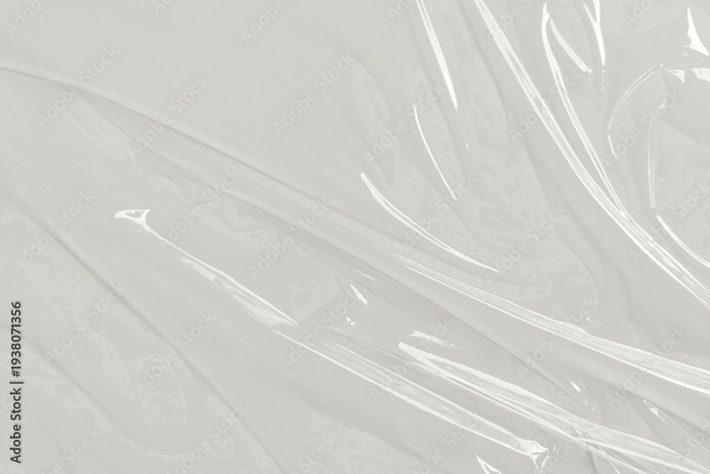 Fototapeta premium Plastic transparent cellophane bag on white background. White plastic film wrap texture background. White Plastic Bag Texture