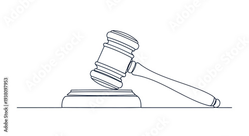 Gavel on a wooden block.