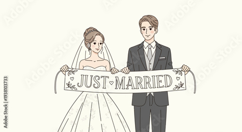 Bride and Groom Holding Just Married Sign.