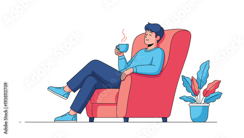 Young man sitting comfortably in a red armchair while drinking hot coffee or tea and relaxing at home with a green houseplant.